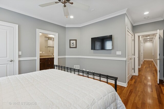 bedroom featuring crown molding, wood finished floors, recessed lighting, connected bathroom, and ceiling fan