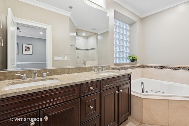 full bathroom with a stall shower, a jetted tub, double vanity, crown molding, and recessed lighting