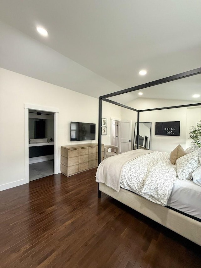 bedroom with recessed lighting and wood finished floors
