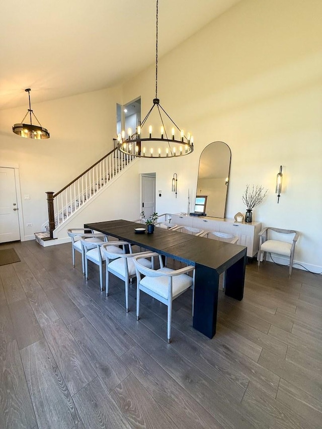 rec room with an inviting chandelier, baseboards, and wood finished floors