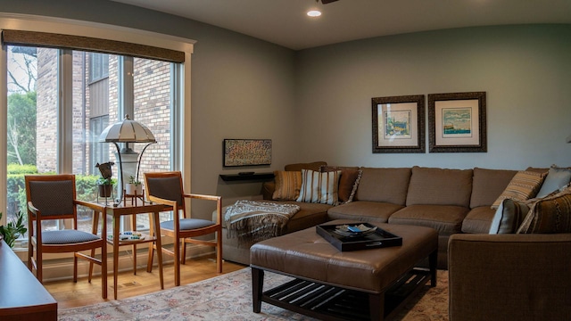 living room with recessed lighting and wood finished floors