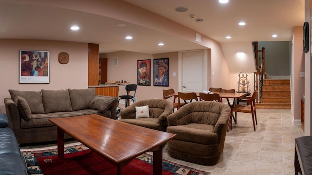 living area featuring recessed lighting, stairway, and light tile patterned floors