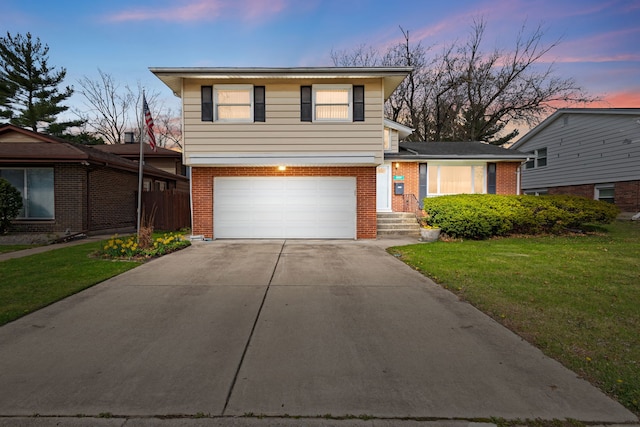 18524 Center Ave, Homewood, IL 60430 - view of front facade with an attached garage, brick siding, a front yard, and concrete driveway