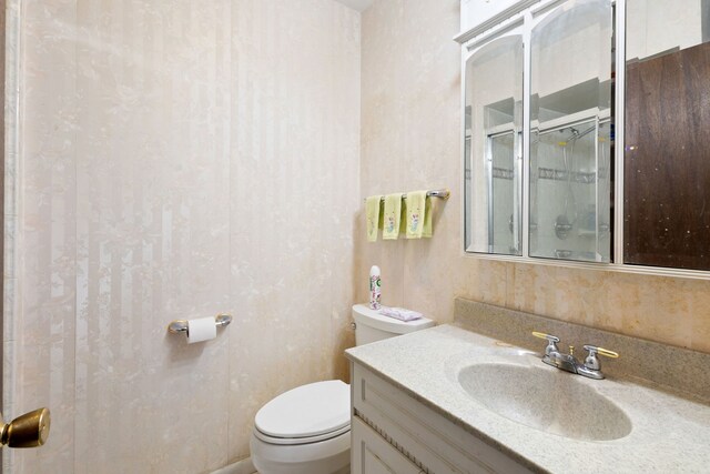 18524 Center Ave, Homewood, IL 60430 - bathroom with toilet and vanity