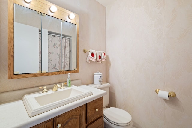 18524 Center Ave, Homewood, IL 60430 - bathroom featuring toilet, vanity, and wallpapered walls