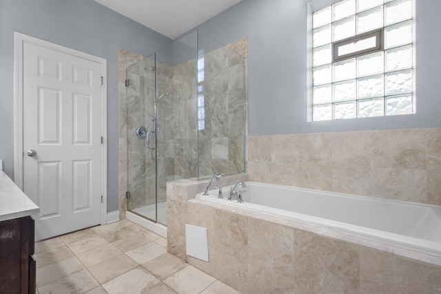 4532 S Indiana Ave Unit 2N, Chicago, IL 60653 - full bathroom featuring a garden tub, vanity, and a stall shower