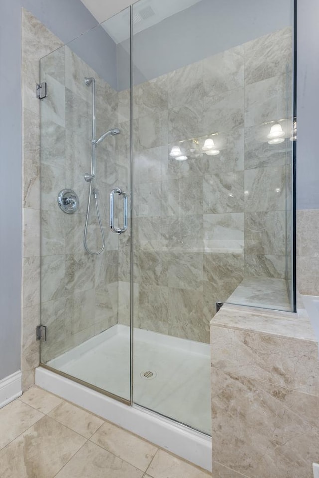 4532 S Indiana Ave Unit 2N, Chicago, IL 60653 - bathroom with a stall shower and tile patterned floors