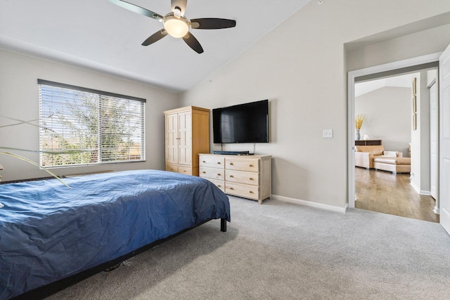 68 Tall Grass Ct, Streamwood, IL 60107 - bedroom featuring baseboards, light carpet, ceiling fan, and vaulted ceiling