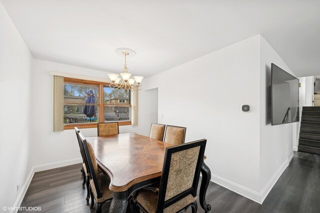 dining space featuring stairs, baseboards, a notable chandelier, and dark wood-type flooring