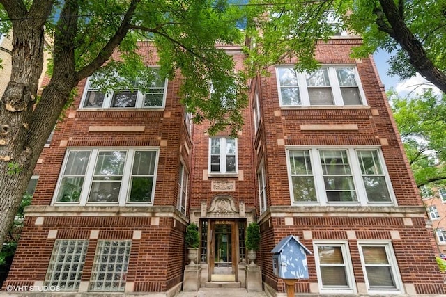 multi unit property featuring brick siding