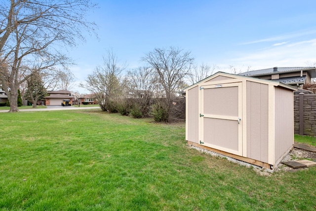 8509 Hemlock St, Orland Park, IL 60462 - view of yard featuring an outdoor structure and a storage unit