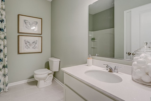 bathroom featuring baseboards, a shower with curtain, toilet, vanity, and tile patterned flooring