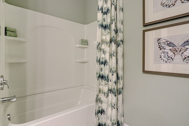 bathroom featuring shower / bath combination with curtain