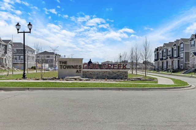 community sign with a residential view