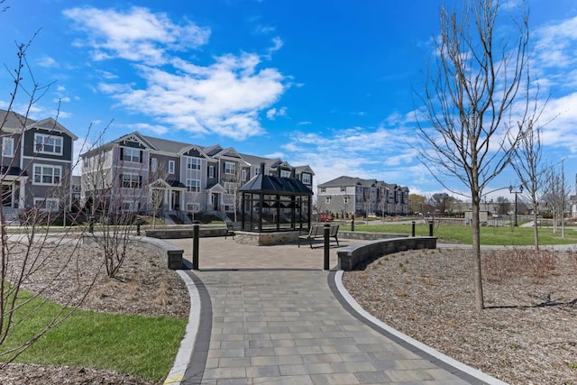 view of community featuring a residential view and a gazebo