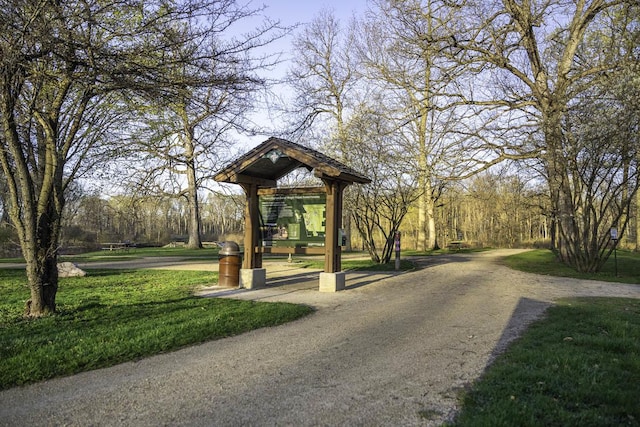 surrounding community with a yard