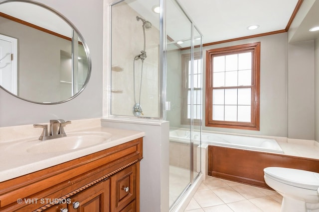 bathroom featuring vanity, a stall shower, tile patterned flooring, crown molding, and toilet