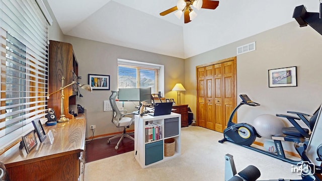 office featuring baseboards, a ceiling fan, and visible vents