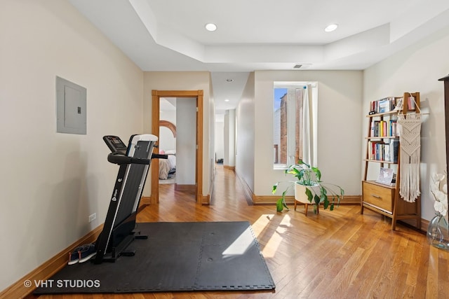 4041 N Kilbourn Ave Unit 2N, Chicago, IL 60641 - workout room featuring baseboards, electric panel, hardwood / wood-style flooring, and visible vents