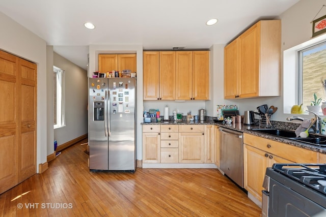 4041 N Kilbourn Ave Unit 2N, Chicago, IL 60641 - kitchen with stainless steel appliances, recessed lighting, a sink, and light wood finished floors