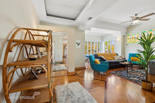 4041 N Kilbourn Ave Unit 2N, Chicago, IL 60641 - living room featuring baseboards, ceiling fan, visible vents, and hardwood / wood-style floors