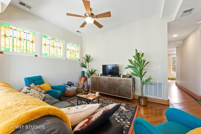 4041 N Kilbourn Ave Unit 2N, Chicago, IL 60641 - living room with ceiling fan, wood finished floors, and visible vents