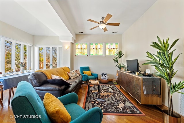 4041 N Kilbourn Ave Unit 2N, Chicago, IL 60641 - living area featuring ceiling fan, wood finished floors, and a wealth of natural light