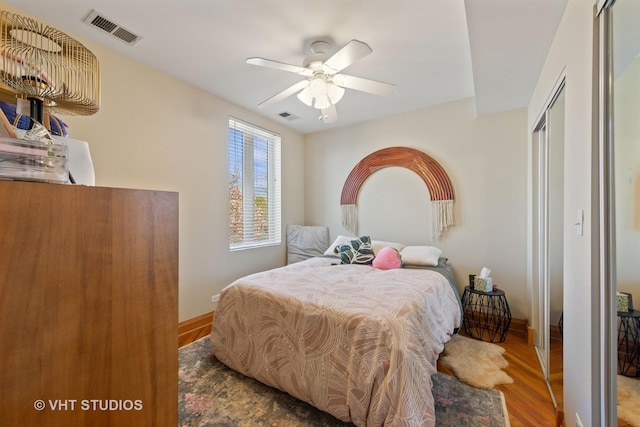 4041 N Kilbourn Ave Unit 2N, Chicago, IL 60641 - bedroom featuring visible vents, baseboards, and wood finished floors