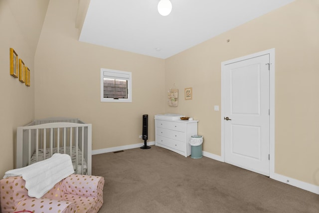 1020 Cedar Ct, Oak Park, IL 60302 - carpeted bedroom featuring a crib and baseboards