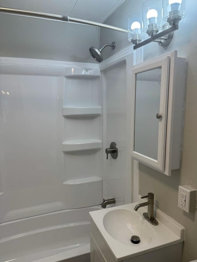 full bathroom with an inviting chandelier, vanity, and shower / bathing tub combination