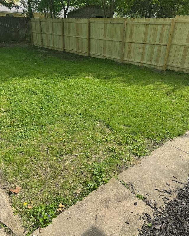 view of yard featuring fence