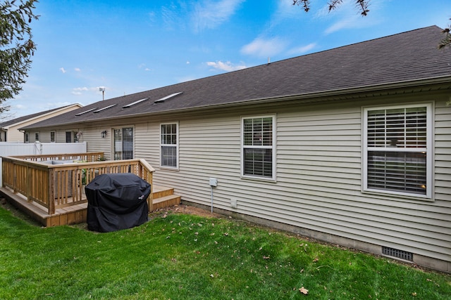 1318 Ridge Pointe Dr, Monticello, IL 61856 - rear view of house with a lawn, a wooden deck, crawl space, and a shingled roof