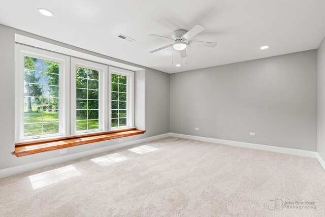 2015 N Woodlawn Park Ave, Mchenry, IL 60051 - empty room featuring carpet flooring, baseboards, a ceiling fan, and visible vents