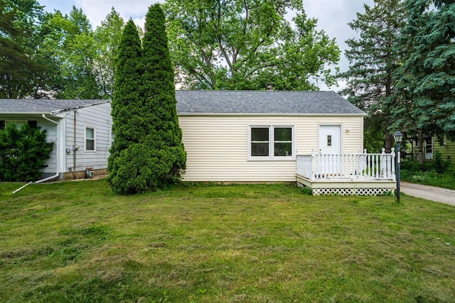 212 Keiser Ave, Normal, IL 61761 - view of front of property featuring a deck, a front yard, and roof with shingles