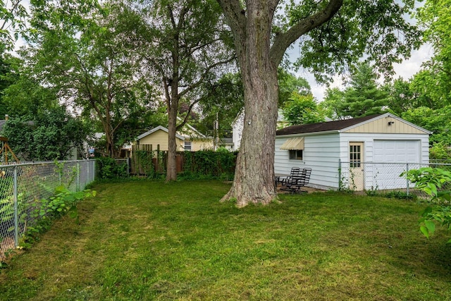 212 Keiser Ave, Normal, IL 61761 - fenced backyard with a detached garage
