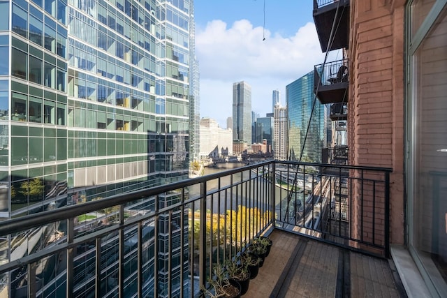 balcony featuring a skyline view