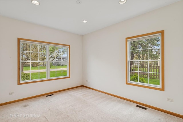 3625 Johns Manville Ave, Gurnee, IL 60031 - carpeted empty room with a healthy amount of sunlight, baseboards, and visible vents