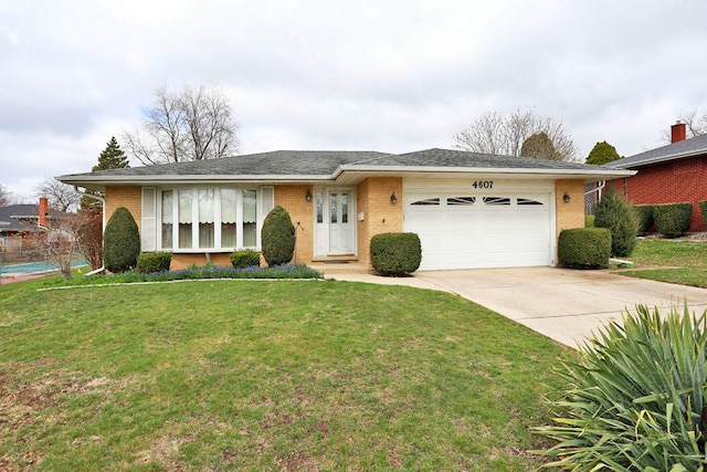 ranch-style home with a garage, a front yard, concrete driveway, and brick siding