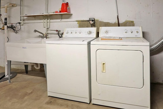 clothes washing area with laundry area and separate washer and dryer
