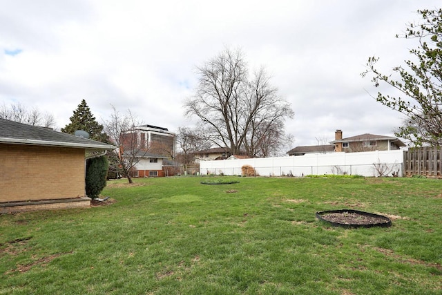 view of yard with fence
