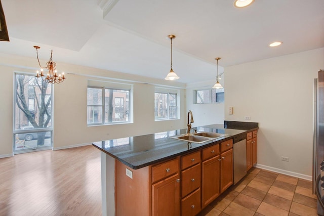 2317 W Wolfram St Unit 211, Chicago, IL 60618 - kitchen featuring a sink, stainless steel appliances, a peninsula, plenty of natural light, and recessed lighting