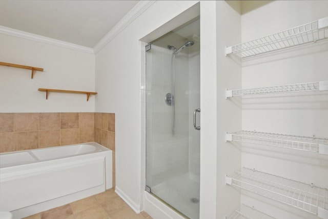 2317 W Wolfram St Unit 211, Chicago, IL 60618 - full bath featuring crown molding, a shower stall, a garden tub, and tile patterned floors
