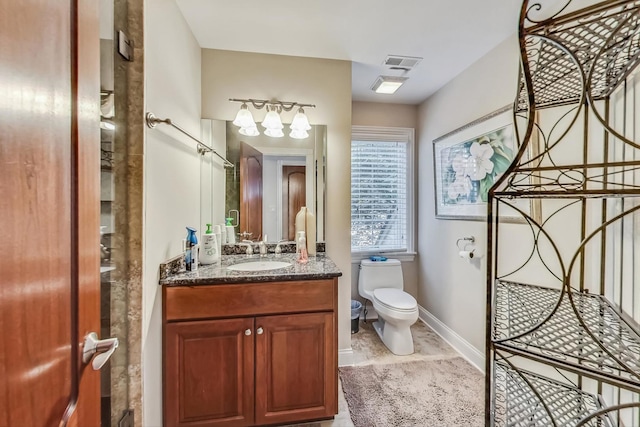 105 Fuller Rd, Hinsdale, IL 60521 - bathroom with toilet, vanity, baseboards, and visible vents