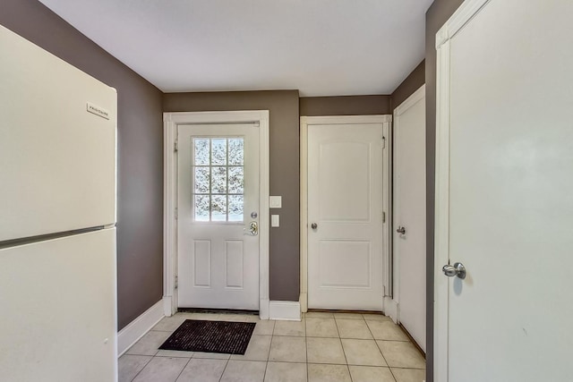 105 Fuller Rd, Hinsdale, IL 60521 - doorway to outside with light tile patterned floors and baseboards