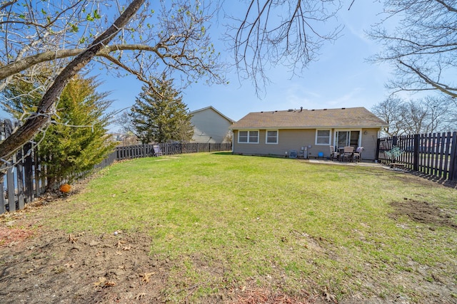 view of yard with a fenced backyard and a patio area
