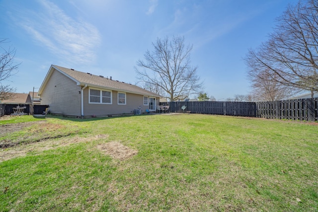view of yard featuring a fenced backyard