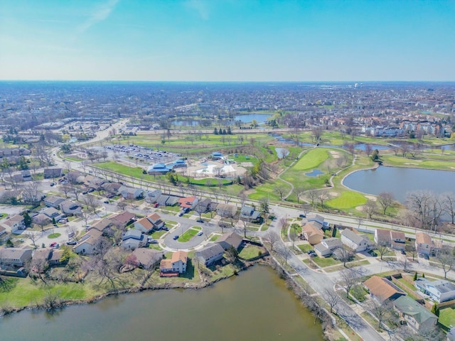 aerial view with a residential view and a water view
