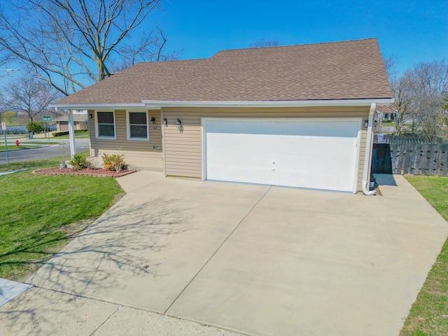 ranch-style home featuring driveway, a front lawn, fence, and roof with shingles