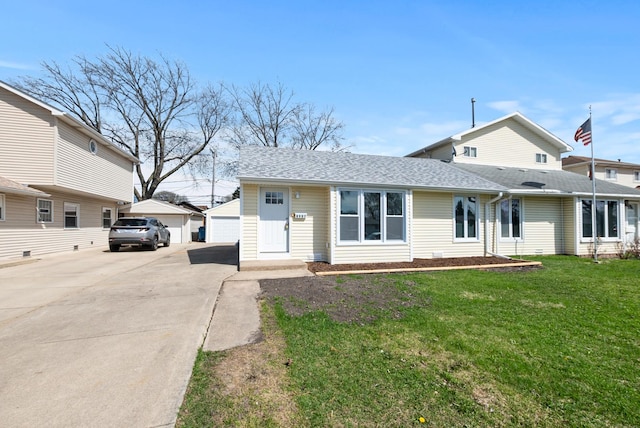 8907 S Komensky Ave, Hometown, IL 60456 - view of front of house with a garage, a front lawn, an outdoor structure, and a shingled roof