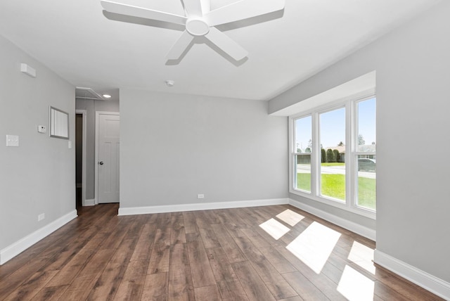 8907 S Komensky Ave, Hometown, IL 60456 - empty room with ceiling fan, baseboards, attic access, and wood finished floors